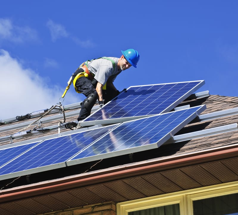How do we repair roofs that have solar panels?